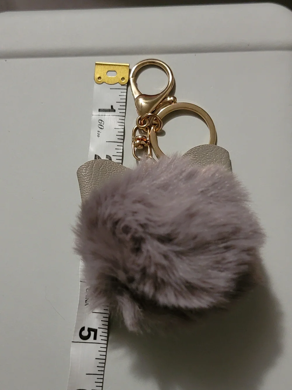 Gray Faux Fur Pom Bow Keychain with Gold Hardware